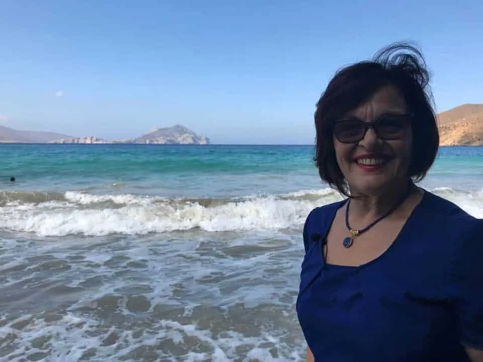 Irene Giannakopoulos by the sea in Amorgos
